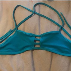 Jolyn Cross Back Vent Top